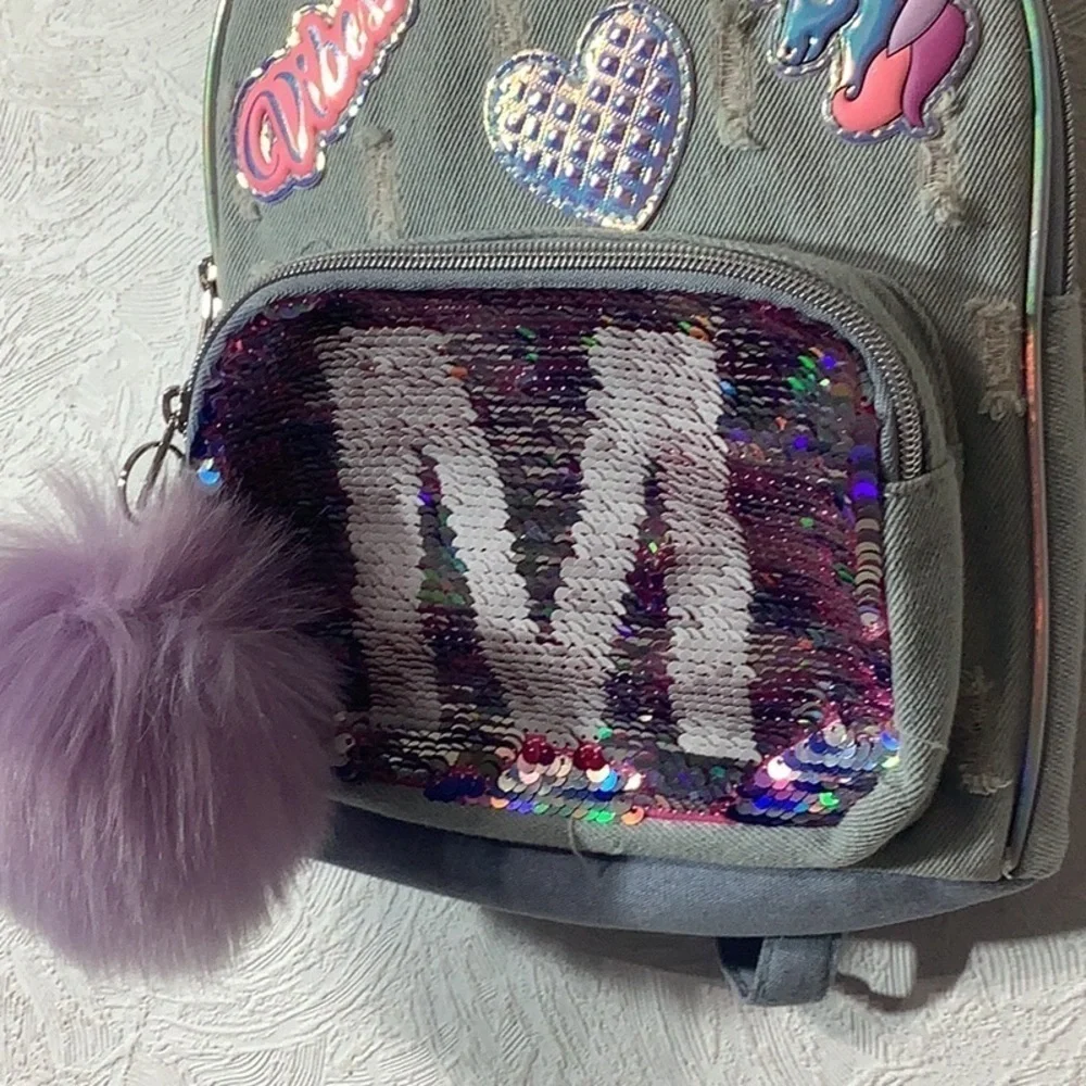 Justice - distressed denim mini bagpack - reverse sequins - letter M and more